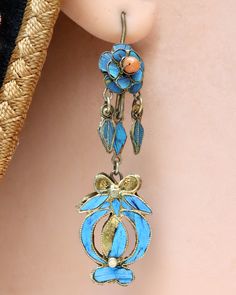 These dangle earrings are antiques that originate from the Qing Dynasty, where a noble woman would have worn an intricate design such as this for a special occasion.Antique stock, made by hand in the late 19th or early 20th century. Gilded silver with kingfisher feather (tian-tsui) finish. 2 inches tall with french hook ear wires. Tian Tsui, Qing Dynasty Jewelry, Dynasty Jewelry, Feather Ornaments, Kingfisher Feather, Noble Woman, Articulated Fish, Jewel Box, Chinese Dress