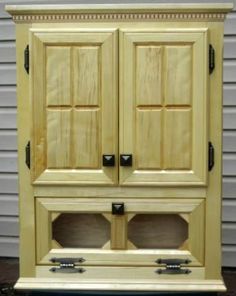 a cabinet with two doors and three drawers