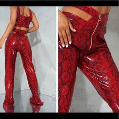 Add Some Serious Attitude To Your Weekend Wardrobe With These Next-Level Bottoms. Featuring A Red Snake Print Faux Leather Material With Cut Out Hip Detail And A Straight Leg Fit, We're Obsessed. Style With A Matching Top, Heels, And Hoop Earrings For An Insta-Worthy Combo. Length Approx 86.5cm/34" Trendy Red Club Bottoms, Trendy Red Bottoms For Club, Fitted Leather Pants With Zipper For Party, Glamorous Red Pants For Night Out, Red High Waist Leather Pants For Spring, High-waisted Red Leather Pants For Spring, High Waist Red Leather Pants For Spring, Chic Party Pants With Zipper Closure, Spring Red High-waist Leather Pants