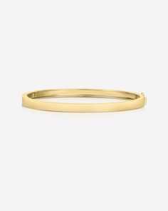 The must-have piece for any wrist stack, these solid gold bangles are available in 3 widths to layer up or wear alone. Add a custom engraving for a personal touch. Solid Gold Bangle, Normal Body Temperature, Wrist Stack, Wrist Stacks, Necklace Length Guide, Bracelet Size Chart, Kids Rings, Kids Bracelets, Size Chart For Kids