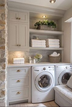 a washer and dryer in a small room