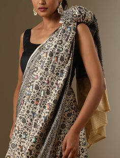 Elevate Elegance with Shikargah Collection Banarasi Silk SareeIndulge in opulence with our Shikargah Collection Banarasi Silk Saree. Inspired by regal hunting scenes, the exquisitely hand-woven Shikargah motifs come to life on luxurious Banarasi silk. Each piece is a testament to skilled craftsmanship, embodying cultural richness and timeless allure. The incorporation of Katan silk lends a touch of luxury, enhancing the texture and opulence.Our Shikargah Collection pays homage to the art of weav Elegant Pre-draped Saree With Dupatta In Brocade, Elegant Brocade Pre-draped Saree With Dupatta, Elegant Pre-draped Brocade Saree With Dupatta, Elegant Jamawar Pre-draped Saree For Transitional Season, Elegant Handloom Jamawar Pre-draped Saree, Festive Brocade Handloom Pre-draped Saree, Elegant Handloom Pashmina Shawl For Wedding, Elegant Jamawar Pre-draped Saree With Dupatta, Transitional Designer Wear Pre-draped Jamawar Saree