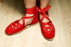 Women's red handmade leather espadrilles sandals with ties. Unusual and yet classic, these chick red tie shoes will be your everyday choice for the summer, perfect everyday and holiday shoes. These espadrille soles are made of jute. Jute fiber is a natural material, so your feet can breath during the hot summer days. The base of the sole is totally covered with a vulcanized rubber layer for a long duration. Each pair is hand-sewn with natural materials. Materials: Red suede upper Red polka dot c Leather Sole Lace-up Sandals For Spring Vacation, Summer Lace-up Sandals With Leather Sole And Flat Heel, Lace-up Sandals With Leather Sole For Spring Vacation, Spring Vacation Lace-up Sandals With Leather Sole, Red Lace-up Sandals For Spring, Spring Flat Heel Lace-up Sandals With Rubber Sole, Casual Leather Sole Lace-up Sandals For Summer, Casual Lace-up Sandals With Leather Sole For Spring, Spring Beach Lace-up Sandals With Leather Sole