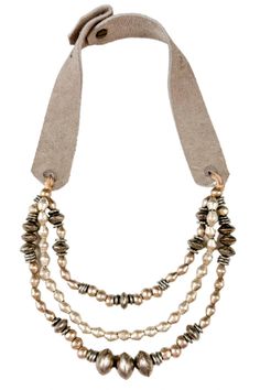 The Twine & Twig Marrakech Necklace is designed with silver metal and globally sourced beads that are strung onto individual strands and tied together onto our signature branded suede straps. The necklace features two length options with a brass snap closure.Tied onto a pair of Suede Straps.Twine & Twig jewelry may have slight variations and natural imperfections enhancing its raw, handcrafted look.Please reference secondary images for the approximate length of the necklace. Twine And Twig, Twig Jewelry, Classic Necklace, Necklace Silver, Marrakech, Twine, Silver Necklaces, Snap Closure, Metallic Silver