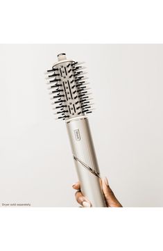 What it is: A round brush that can be used with your FlexStyle to dry and style hair at the same time.Who it's for: Ideal for all hair types and textures.What it does: The brush is designed with smoothing boar and nylon detangling bristles to help grab, smooth and defrizz, whlie delivering bounce. The brush dries as it styles with powerful airflow, bringing your hairs shine and volume to a new level. Compatible with Shark FlexStyle Air Styling & Drying Systems (HD400's series) (sold separately) Shark Flexstyle, Blow Dry Brush, Dry Brush, Round Brush, Hair Shine, Style Hair, All Hair Types, Blow Dry, Hair Types