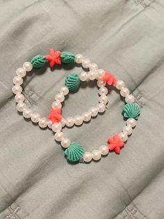 Super cute beachy bracelet set kids size Playful Plastic Jewelry For The Beach, White Plastic Jewelry For Summer, White Plastic Summer Jewelry, Playful Plastic Beach Jewelry, Trendy Plastic Beaded Bracelets For Beach, Plastic Jewelry For Summer Beach, Casual Plastic Jewelry For Summer, Green Plastic Summer Jewelry, Playful Blue Jewelry For The Beach