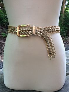 Vintage women's fashion belt gold Lamé 80s metal chain metallic maxi gold woven 80s dance  ITEM DESCRIPTION: Offering this fashion statement gold Lamé chain link belt adjustable belt.  This belt has a quality weight. It features gold-tone linked metal with the 2 inner strip of links wrapped with gold-tone, metallic Lamé material. The only marking on the belt is "L". MEASUREMENTS: This dance floor glam mod belt measures approximately 39 1/2 inches long (including buckle) and 1 1/8 inches wide. Th Movie Wardrobe, 80s Dance, Metal Chain Belt, 80s Metal, Holiday Party Fashion, Glam Party, Gold Lame, Gold Belts, Girly Accessories