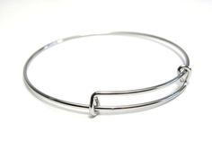 "High quality stainless steel bracelet bangle/bangle wire Diameter: 2.5\" (64mm) inner diameter - can be widened! Thickness: 1.5 mm Material: Stainless steel 304 Colour: platinum silver - nickel free Amount per package: 1 High quality stainless steel bangles, adjustable to fit most wrists. Won't rust, won't peel, tarnish-resistant! Just personalise it with your favourite stainless steel charms, sterling silver components or beaded components!" Stainless Steel Bangles, Stainless Steel 304, Silver Prices, Bracelet Bangle, Steel Bracelet, Stainless Steel Bracelet, Bangle Bracelets, Silver Bracelet, Platinum