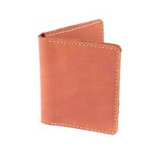 Leather wallets are a timeless accessory. Our Tom card wallet is handcrafted by skilled artisans with the highest quality sustainable leather. With a slim and functional design, this classic wallet can hold all the important cards you need without being bulky. Features 4" length x 3" width x 0.5" height x 6.5" open Credit card slots High quality leather from environmentally conscious and sustainable sources. Lifetime guarantee Classic Bifold Wallet For Personal Use, Everyday Trifold Smooth Grain Card Holder, Artisan Rectangular Card Holder As Gift, Everyday Trifold Card Holder With Smooth Grain, Artisan Rectangular Card Holder Gift, Minimalist Trifold Card Holder With Card Slots, Classic Handmade Wallet For Everyday Use, Classic Rectangular Trifold Wallet For Personal Use, Brown Rectangular Wallet With Waxed Finish