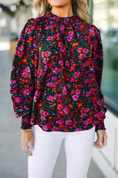 We can't change this blouse nor would we want to! It's gorgeous! That floral print is so vibrant and feminine! This blouse also has a very classic fit that we can't get over! You are going to love wearing this beauty for a day at work or for grabbing lunch with a friend! Ruffled round neckline Button keyhole back Long bubble sleeves with smocked cuffs Ditsy floral print No stretch Baileigh is wearing the small. Patterned Blouse With Bold Print, Printed Blouse For Day Out In Fall, Printed Blouse For Fall Day Out, Fall Patterned Blouse With Bold Print, Feminine Floral Print Patterned Top, Spring Long Sleeve Tops With Bold Print, Chic Patterned Blouse With Vibrant Print, Patterned Blouse With Bold Print For Spring, Multicolor Feminine Blouse With Ditsy Floral Print