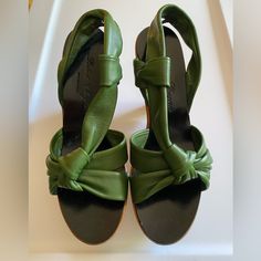 Stunning Robert Clergerie Size 8.5 Wedge Sandals In Buttery Soft Green Leather. Unworn In Original Box. 4 1/2 Inch Heel With 2 Inch Platform So Feels Like A 2 1/2 Inch Heel. The Original Box Is Distressed A Bit. Green Leather Closed Toe Wedge Sandals, Green Wedge Sandals With Heel And Ankle Strap, Green Wedge Sandals With Heel Strap And Round Toe, Green Wedge Sandals With Block Heel, Green Leather High Heel Wedge Sandals, Green High Heel Leather Wedge Sandals, Green Closed Toe Wedge Sandals With Removable Insole, Elegant Green Wedge Sandals For Summer, Chic Green Open Toe Wedge Sandals