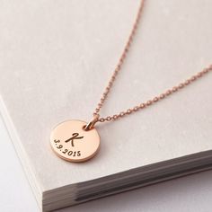 "This beautiful charm necklace personalized with kid's initial and birthdate is a perfect gift for a new mother! ► INITIAL & BIRTHDATE NECKLACE * Initial disc measure 1/2 inches (13mm) * By default, silver items comes with BLACK engraving and gold-plated item comes with CLEAR engraving. * All of our jewelry are handmade from scratch and packaged with care in our workshop. ► HOW TO ORDER - Select color and necklace length you would like at the drop down options. - Include in the \"Add your pe Baby Initial Necklace For Mom, Personalized Rose Gold Charm Necklaces As Gift, Personalized Rose Gold Charm Necklace For Birthday, Personalized Rose Gold Birthstone Charm Necklace, Initials Charm Necklace For Birthday And Mother's Day, Personalized Round Pendant Initial Necklace For Birthday, Round Initial Necklace For Mother's Day And Birthday, Hand Stamped Initial Pendant Charm Necklace For Mother's Day, Rose Gold Initial Pendant Charm Necklace For Birthdays