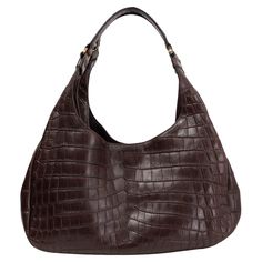 100% authentic Bottega Veneta shoulder bag in espresso brown matte crocodile. Closes with a magnet on top. Lined in light beige suede with a cell phone pocket against the front and a zipper pocket against the back. Has been carried and is in excellent condition. Measurements Height 21cm (8.2in) Width 38cm (14.8in) Depth 15cm (5.9in) Drop of the Handle 22cm (8.6in) Hardware Light Gold-Tone Blindstamp 125787 V91202040 All our listings include only the listed item unless otherwise specified in the description above. Bottega Veneta Chain Pouch, Bottega Veneta The Pouch, Bottega Bag, Bottega Veneta Pouch, Bottega Veneta Cassette, Hand Bags For Women, Bottega Veneta Bag, Sacs Design, Bottega Veneta Bags