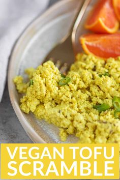 a close up of food on a plate with text overlay that reads vegan tofu scramble