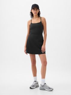 Soft brushed jersey exercise dress.  Moisture Wicking helps keep your skin dry.  Stretch allows freedom of movement while providing superior shape retention.  Square neck.  Adjustable spaghetti straps.  Built-in shorts.  This exercise dress is made with 79% recycled polyester.  Using recycled materials helps to conserve resources and reduce waste.  This product was made in a factory that invests in gender equality and women’s empowerment.  Through RISE Reimagining Industry to Support Equality) a