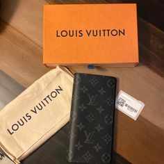 This Is A Mens Long Wallet Lv Original! Brand New Comes With Box And Dust Bag. Never Used! It Does Have Initials Ecg. But Like I Said Never Used Brand New. Luxury Black Wallet With Logo, Luxury Rectangular Wallet With Logo, Luxury Rectangular Wallets With Logo, Modern Black Wallet With Dust Bag, Luxury Brown Wallets With Logo, Designer Business Wallets With Logo, Designer Business Wallet With Logo, Designer Logo Wallets For Formal Occasions, Luxury Wallet In Monogram Canvas