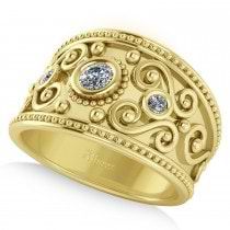 a gold ring with two blue stones on it's center and an intricate design in the middle