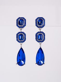 These Blakely earrings feature sparkling rhinestones and dangly stones for a touch of glamour. With their unique design, they can easily transition from day to night. Elevate any outfit with these stylish earrings that are sure to make a statement. SizeH: 0.6" W: 0.5" QualityCrafted from premium materials for quality and endurance. ImportedECQ210 Crystal Drop Earrings For Party, Crystal Linear Drop Earrings For Parties, Blue Metal Earrings With Rhinestones, Crystal Linear Earrings For Party, Crystal Jewel Drop Earrings, Sparkling Stone Dangle Earrings For Party, Party Linear Dangle Earrings With Sparkling Stones, Party Dangle Earrings With Sparkling Stones, Party Earrings With Cubic Zirconia Jewels