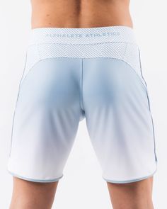 HIGHLIGHTS.. Unlined boardshort. 9” inseam Reflective branding at leg opening and back waistband Elastic waistband with adjustable self-tie drawcords Color-blocking panelling Water resistant fabric FIT SUGGESTION. This item runs true to Alphalete’s standard sizing.. Fit is based off of waist size in inches.. If you are between sizes, we recommend sizing up for a relaxed fit.. Eric is 6’2”/188cm, wearing a size 32. MATERIALS AND WASHING DIRECTIONS. 67% Nylon, 23% spandex. Due to the high saturati White Sports Bottoms With Contoured Waistband, Functional White Bottoms For Light Sports, White Activewear With Elastic Side Panels For Gym, White Activewear For Gym With Elastic Side Panels, White Activewear With Elastic Side Panels For Workout, White Gym Activewear With Elastic Side Panels, White Moisture-wicking Swimwear For Training, Functional White Short Leg Bottoms, White Gym Bottoms With Comfort Waistband