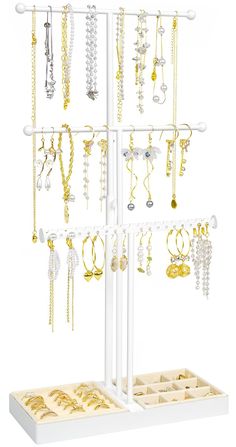 a jewelry rack with several different types of necklaces