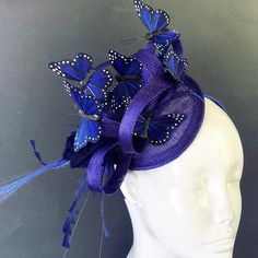 butterfly headpiece, Kentucky Derby fascinator Hat, women fascinators From our Whimsical Collection, this elegant women's fascinator Features a purple Headpiece with Blue butterflies perfect for your special event; you have the option to pick others butterfly colors and headpiece color as well! I N C L U D E D Black sinamay fascinator on headband base topped with high-quality intricately detailed butterflies. In secure box packaging to keep form. S H I P P I N G - Processed same day or within 24 Blue Purple Butterfly, Butterfly Fascinator, Butterfly Colors, Butterfly Headpiece, Hat Tea Party, Kentucky Derby Fascinator, Sinamay Fascinator, Metal Mask, Derby Fascinator