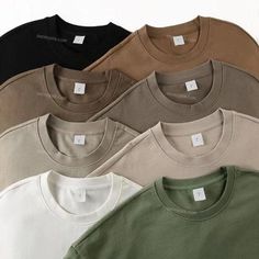 nan. #loose fit #Shirt Neutral T-shirts, Cotton T-shirt, Oversized Khaki Cotton T-shirt, Tan T Shirt Outfit, Short Sleeve Casual Sweatshirt, Casual Solid Color Short Sleeve Sweatshirt, Khaki Long Sleeve T-shirt For Streetwear, Oversized Khaki Crew Neck Top, Heavyweight T Shirt