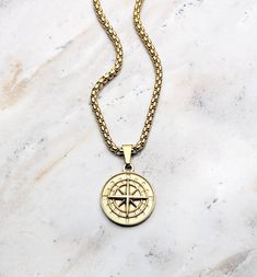 "《《 SYMBOLIC COLLECTION 》》 THE DETAILS The \"GOLD COMPASS MEDALLION\" Necklace is designed with an exquisitely detailed shiny Gold Stainless Steel Compass Pendant, hung from a Gold Stainless Steel Box Chain available in your choice of length! View this Pendant in Silver Stainless Steel here: https://www.etsy.com/listing/1095378388/ This is a 5 STAR RATED Necklace!! THE SYMBOL 🧭COMPASS: Known as a symbol of \"Travel, Direction, & Adventure\" often worn or gifted to symbolize two souls travel Compass Pendant Necklace, Necklace Length Chart, Gold Medallion Necklace, Compass Pendant, Box Chain Necklace, Jewelry Care Instructions, Medallion Necklace, Mens Gold, Matching Bracelets