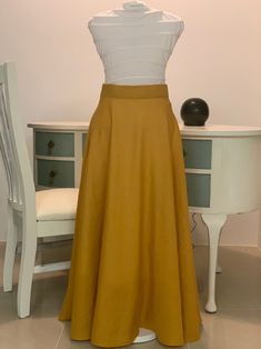 Mustard colour cotton-linen high waisted 50s style circle skirt. Fine quality fabric, lined for an elegant finish.  Has an  invisible zipper at the back, 5 cm wide wristband and closing with a cute wooden button.  Ankle length for a romantic silhouette.  This skirt is design to sit at the waist and the length to hem can vary, under the knee or mid calf for a 50's look or maxi if you prefer.  This listing is for size 10 measuring 70 cm on the waist and is 90 cm long I can make it to order in any 50s Look, 50's Style, Women Skirt, 50s Fashion, Mode Vintage, Circle Skirt, Clothing Women, Vintage Stil, Skirt Length