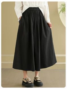 Casual Solid A-line Maxi Skirt, Casual A-line Skirt With Elastic Waistband, Casual A-line Maxi Skirt With Elastic Waistband, Casual A-line Pleated Maxi Skirt, Black Cotton Knee-length Skirt, Black Knee-length Cotton Skirt, Elegant Long Skirt With Relaxed Fit, Casual A-line Maxi Skirt Solid Color, Black Cotton Pleated Midi Skirt