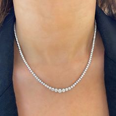 Heads are sure to turn when wearing this exquisite tapered diamond tennis necklace. This opulent arrangement of diamonds set in gold glistens beautifully against the skin. We know you'll fall in love with it! Metal: 14k White Gold / 14k Yellow Gold / 14k Rose Gold Round Brilliant Cut Natural Diamonds: Approx. 7.49 ctw G Color and SI1-2 Clarity Diamonds Length: 16 inches Closure: Box Clasp Looking for a different length? Please email us. Delicate Diamond Necklace, College Rings, Diamond Tennis Necklace, Pearl And Diamond Necklace, How To Make Rings, Expensive Jewelry, Tennis Necklace, Bridal Bands, Band Bracelet