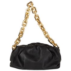 100% authentic Bottega Veneta Chain Pouch bag in supple black calfskin leather with a chunky golden chain handle. Opens with a magnetic-tab fastening and is lined in black leather. Has been carried once or twice and is in excellent condition. Measurements Height 14cm (5.5in) Width 32cm (12.5in) Depth 10cm (3.9in) Drop of the Handle 24cm (9.4in) Shoulder Strap Length 64cm (25in) Hardware Gold-Tone Blindstamp BO8967532T All our listings include only the listed item unless otherwise specified in th Bottega Veneta Chain Pouch, Bottega Bag, Bottega Veneta Handbag, Bottega Veneta Bag, Bv Bag, Golden Chain, Cheap Bags, Leather Hobo Bag, Chain Bag