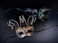 This couple's Masquerade Mask pairing complements any Mardi Gras themed attire. Gold, purple and green vibrant colors to complete your Mardi Gras look no matter what you wear!  I N C L U D E D Available as a couple's set.   Masks come with matching double sided satin ribbons attached. S H I P P I N G  -   Processed same day or within 24 hours.  1-2 day guaranteed delivery services offered, add items to cart and click on shipping tab for rates.  Pls leave a check out note with your need date & co Mardi Gras Masks And Prosthetics, Black Masquerade Mask For Party Festivals, Black Masquerade Mask For Party And Festivals, Black Masquerade Mask For Carnival, Black Masks For Masquerade Festivals, Black Masquerade Mask For Festivals, Black Masks For Costume Festivals, Black Costume Masks For Festivals, Black Masks For Festivals And Costumes