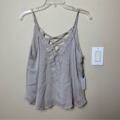 Astr The Label Lace Crisscross Sparkle Cami Size M Nwt Color: Taupe Purchased At Nordstrom Casual Cross-tied Tops For Spring, Spring Cross-back Tops For Day Out, Spring Cross Back Top For Day Out, Cross-tied Strappy Summer Tops, Casual Strappy Top With Cross-tied Details, Strappy Cross-tied Tops For Summer, Strappy Cross-tied Summer Tops, Cross Back Top For Day Out In Spring, Casual Strappy Cross-tied Top