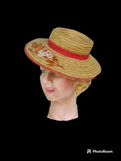 Fabulous hat from the 30s-40s in good condition. Diameter 11 1/2" Height about 3 3/4" Elastic has lost stretch, some fade on the red parts. Vintage Straw Cap For The Beach, Vintage Straw Cap For Beach, Vintage Fitted Boater Hat With Curved Brim, Vintage Flat Brim Fitted Costume Hat, Vintage Flat Brim Costume Hats And Headpieces, Vintage Costume Hats With Short Brim For Garden Party, Vintage Short Brim Costume Hats For Garden Party, Vintage Cloche Costume Hat For Summer, Vintage Fitted Straw Hat With Flat Brim