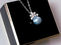 Wedding Light Blue Pearl Sterling Silver Cubic Zirconia Dainty Bridal Pendant Necklace with .925 Sterling Silver Chain. CHAIN is 18 inches (45.7cm) long. PENDANT is about 0.55 inch (1.4cm) long including bail. BRIDAL NECKLACES SECTION: https://www.etsy.com/shop/LanaChayka?ref=seller-platform-mcnav§ion_id=11638944 JEWELRY SETS SECTION: https://www.etsy.com/shop/LanaChayka?ref=seller-platform-mcnav§ion_id=18873488 BRIDAL JEWELRY SETS SECTION: https://www.etsy.com/shop/LanaChayka?ref=seller-platfor Elegant Light Blue Necklace For Anniversary, Elegant Light Blue Necklace For Wedding, Light Blue Jewelry For Wedding, Elegant Blue Necklace For Anniversary, Elegant Light Blue Jewelry For Party, Elegant Light Blue Jewelry For Gift, Elegant Light Blue Wedding Necklaces, Elegant Light Blue Necklaces For Gifts, Elegant Blue Bridal Necklace