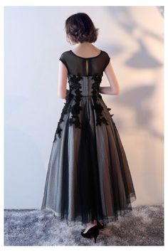 10% off now! Shop vintage tea length black homecoming dress with lace cap sleeves online. Sheprom offers formal, party, casual & more style dresses to fit your special occasions. Black Junior Bridesmaid Dress, Tea Length Bridesmaid Dresses, Formal Dresses For Teens, Black Homecoming Dress, Black Satin Dress, Lace Caps, Junior Bridesmaid Dresses, Formal Party, Dresses For Teens