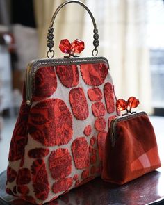 Patty B on Instagram: "New Cecilia in Ruby fabric ❣️ • • • • #borse #borseartigianali #ruby #pattyb #pattybbags #handmade #madeinitaly #bolsos #bolsas #sac #purse #handbags #fashiondesigner #bagdesign #designitaliano #pattybricks" Luxury Handmade Elegant Potli Bag, Brocade Potli Bags, Elegant Red Embroidered Potli Bag, Artisan Hand-stitched Red Bags, Artisan Red Embroidered Bag, Handmade Fabric Purses, Fabric Purses