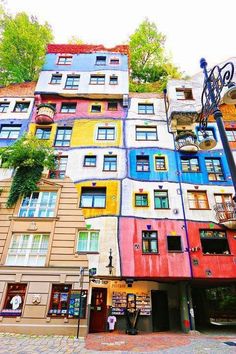 an apartment building with the words best things to do in vienna on it's side