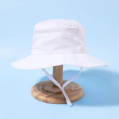 Kids Bucket Hat | Adjustable - Kids Hats - Poshinate Kiddos Baby & Kids Store - View of white hat with strap. Summer Sun Hat With Uv Protection For Play, Adjustable Fit Sun Hat For Outdoor, Summer Bucket Hat With Uv Protection For Play, Adjustable Fit Solid Sun Hat For Outdoor, Adjustable Fit Solid Color Sun Hat For Outdoor, Playful Bucket Sun Hat For Outdoor, Playful Bucket Hat For Outdoor, Adjustable Fit Sun Hat With Uv Protection, Adjustable Fit Outdoor Sun Hat