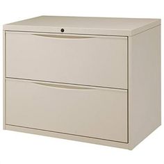 an office file cabinet with two drawers on the bottom, and one drawer in front