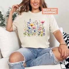 Wild Flower Shirt, Flower Shirts, Aesthetic Botanical Shirt, Botanical Floral Tee, Nature Lover Shirt, Wild Flower Shirts for Ladies Welcome to my Store! Great to see you here. In ourstore, you can find your dream style. BLACK TEXT is used for Yellow, Heather Peach, White, Light Gray, Mint Shirts. Other colored shirts have white text. F I T ∙ & ∙ S I Z I N G :-->These Unisex T-shirts have a modern-fit. Consult the size chart in the pics for an accurate fit. -->Women's sizes are narrower than the waist. -->Sleeves are rolled up in some product pictures. They do not come rolled up on delivery. T I M E ∙ T O ∙ D E L I V E R Y : -->Processing and production time is 1-2 business days. -->Delivery time varies depending on your delivery address. -->You can choose Rush and Express options for fast Casual Floral Print Spring Shirt, Casual Floral Print Shirt For Spring, Spring Relaxed Fit T-shirt With Watercolor Print, Spring Floral Print Shirt, Relaxed Fit Floral Print T-shirt For Spring, Spring Shirt With Floral Print And Short Sleeves, Spring Floral Print Short Sleeve Shirt, Multicolor Watercolor Print T-shirt For Spring, Botanical Print Relaxed Fit Shirt