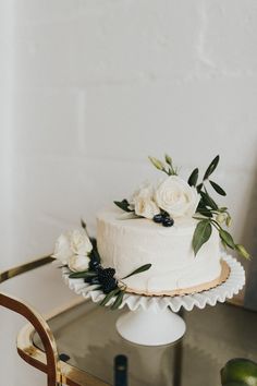 a white cake sitting on top of a table