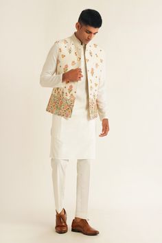 Buy Ivory Silk Embroidery Thread Jawahar Jacket For Men by Dhruv Vaish Online at Aza Fashions. White Nehru Jacket With Floral Embroidery For Spring, Spring White Nehru Jacket With Floral Embroidery, White Embroidered Bandhgala For Spring, White Embroidered Nehru Jacket For Spring, Spring White Embroidered Nehru Jacket, Spring Embroidered White Nehru Jacket, White Resham Embroidery Nehru Jacket For Spring, White Nehru Jacket With Resham Embroidery For Spring, Spring White Bandhgala With Resham Embroidery