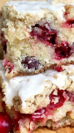 three berry crumb bars stacked on top of each other