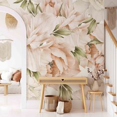 a living room scene with focus on the wallpaper and flowers in the foreground