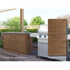 an outdoor kitchen with grill, sink and table in the middle of wood flooring