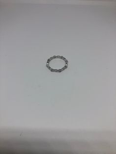 Hand made in Brooklyn NY Micro band ring All pave set Cubic Zirconia in Rhodium Sterling Silver to prevent tarnish Size 7 Can be re sized for a $10 fee PLEASE add ring size to notes in your order!! Thanks. All rings are shipped in a nice gift box. Check out our over a THOUSAND great reviews Engraving is $4 per letter and is not always perfect depending on the piece. It can take a few days if the jeweler is busy. This is payable to Paypal Judithsltd@gmail.com Hypoallergenic Cubic Zirconia Ring, Silver Stackable Eternity Band, Silver Stackable Eternity Band Fine Jewelry, Fine Jewelry Silver Stackable Eternity Band, Stackable Silver Eternity Band, Adjustable Silver Half Eternity Band, Stackable Cubic Zirconia Eternity Band, Silver Oval Eternity Band With Diamond Accents, Silver Adjustable Eternity Band