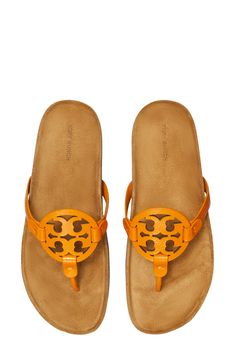 A contoured footbed adds everyday comfort to a breezy sandal topped with an iconic logo medallion. Leather upper and lining/rubber sole Imported Women's Shoes Orange Citrine, Tory Burch Miller, Iconic Logo, Tory Burch Miller Sandal, Sandal Women, Citrine, Women's Shoes, Tory Burch, Rubber Sole