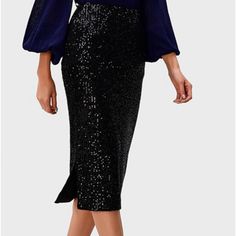 Metallic Black Sequins Cover The Entirety Of The Skirt. Side Zipper And Hook And Eye For Closure. Vented Back. Lined In Black Polyester Style # Cl0088858 Color: Black Dry Clean Only. Size L-12 Approximate Measurements Are: Waist - 30” Hips - 39” Length - 30” Condition: Excellent, Like New (Purchased In Late 2022). Never Worn. Glamorous Stretch Pencil Skirt, Midi Pencil Skirt For Night Out, Fitted Midi Pencil Skirt For Night Out, Glamorous Fitted Pencil Skirt, Evening Fall Pencil Skirt, Fitted Long Pencil Skirt For Night Out, Glamorous Fitted Long Skirt, Sequin Stretch Pencil Skirt, Stretch Sequin Pencil Skirt