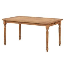 a wooden table sitting on top of a white floor